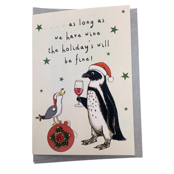 A colourful Christmas card featuring a cute penguin having a glass of wine.