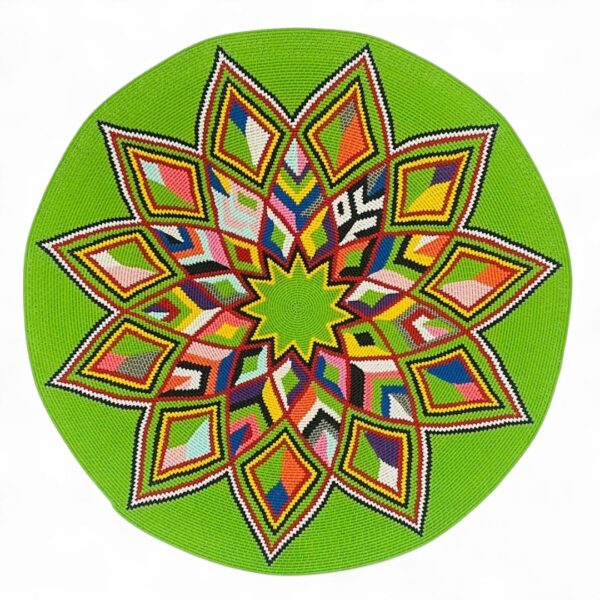 Hand-woven hardwire bowl in a geometric design but Busisiwe Mayise.