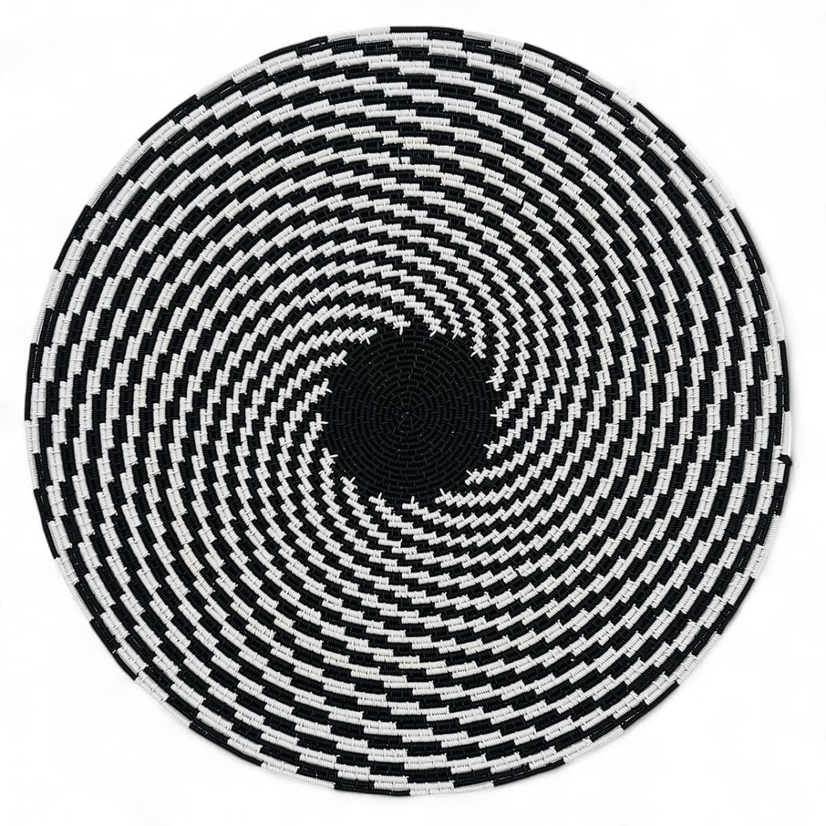 Beautiful home wall decor by Thulisile Mdlalose. A stunning hardwire basket in black and white.