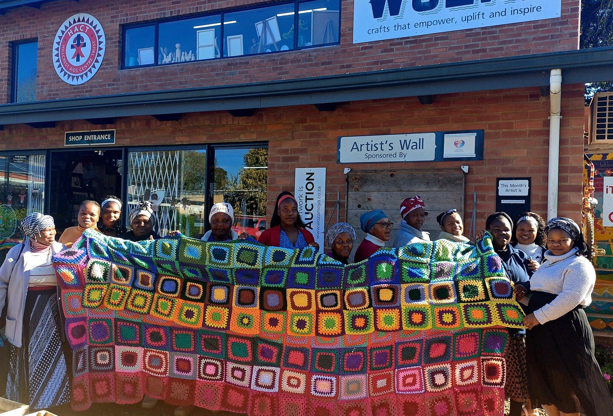 Yarn-bombing-project-croche-squares-with-crafters