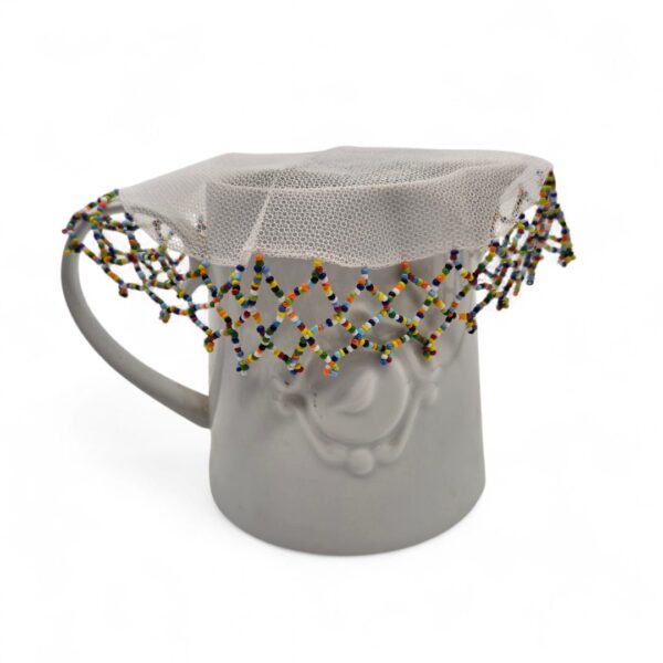 D008-3-white-net-with-assorted-zulu-colour-beads-on-jug Medium to large jug with a net jug cover edged in beads