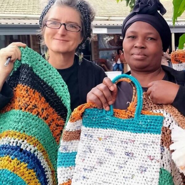 Lynette-holding-her-upcycled-crochet-plastic-products Lynette Phewa holding her upcycled bags