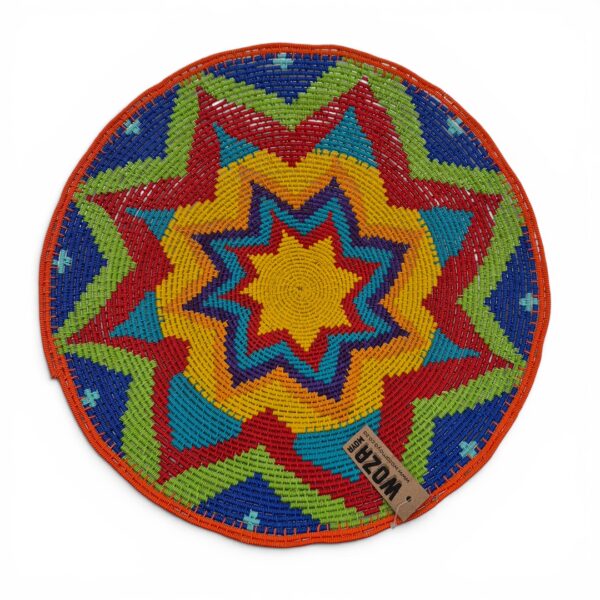 Hardwire bowl by Prudence Bukosini in a bright geometric pattern.