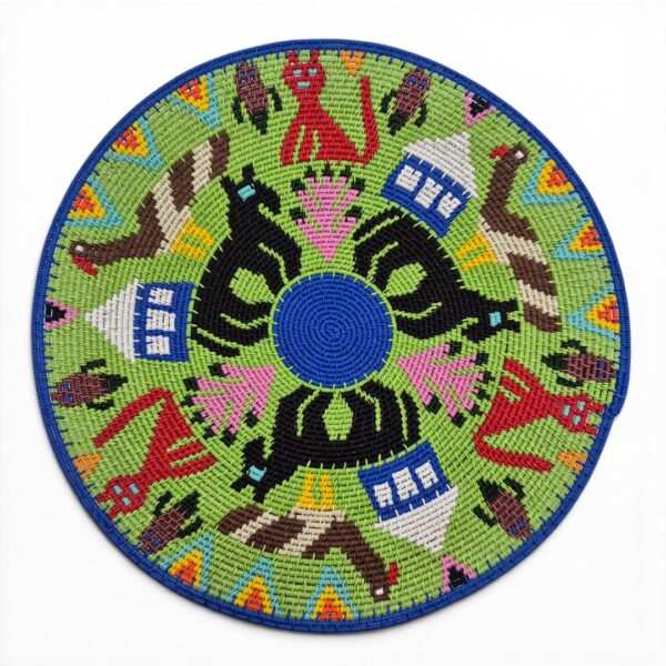 Green hardwrie bowl by mastercrafter Zodwa Sibya featuring animals, birds and zulu rondavels.