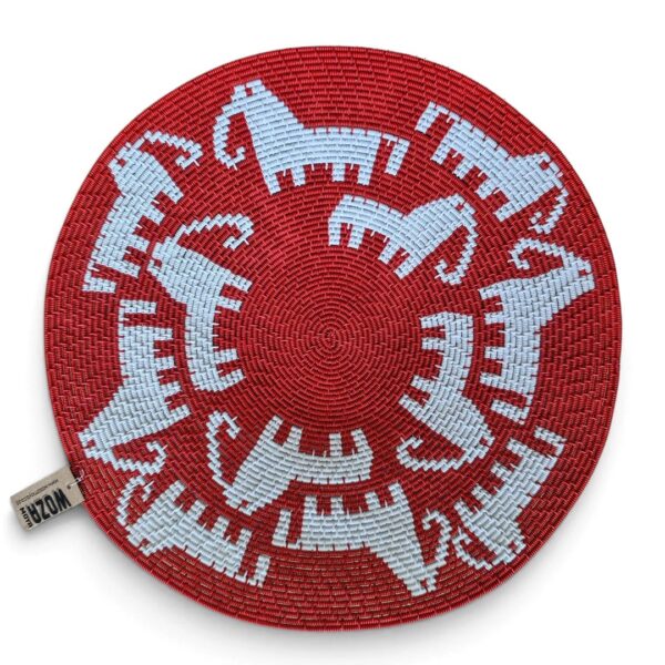 A red hardwire coil-weave bowl by Siphokazi Mlambo.